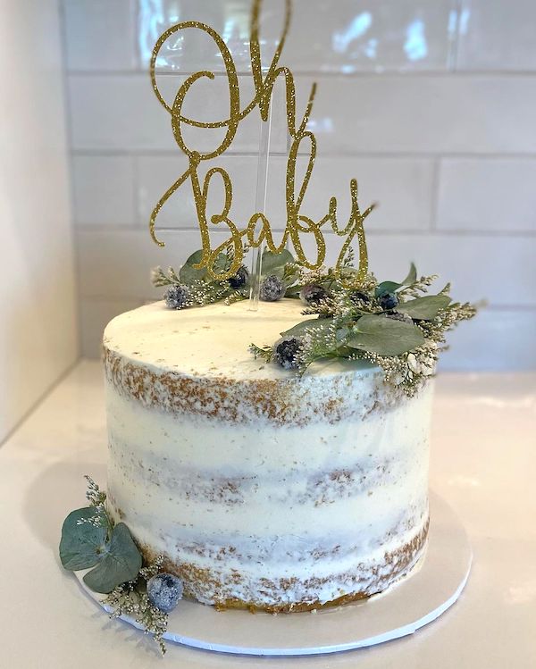 large fancy cake for a baby shower